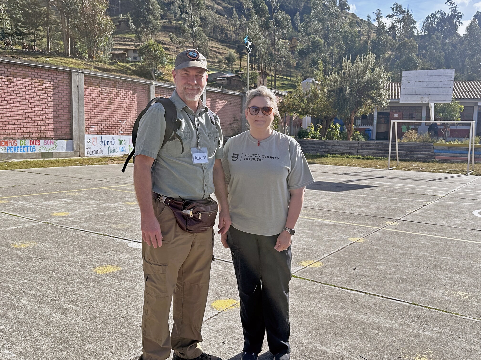 Dr. Gray and Rachel Delargy, RN, stop for a photo outside their clinic in Cajamarca, Peru